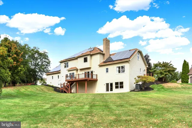 a view of a house with a big yard