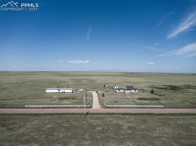5274 South Yoder Road Yoder, CO 80864 - Photo 35 of 42 PAVED COUNTY MAINTAINED ROAD-ENTRANCE OF 5274 & 5354 HOMES