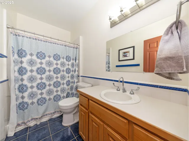 a bed room with a bed and a window