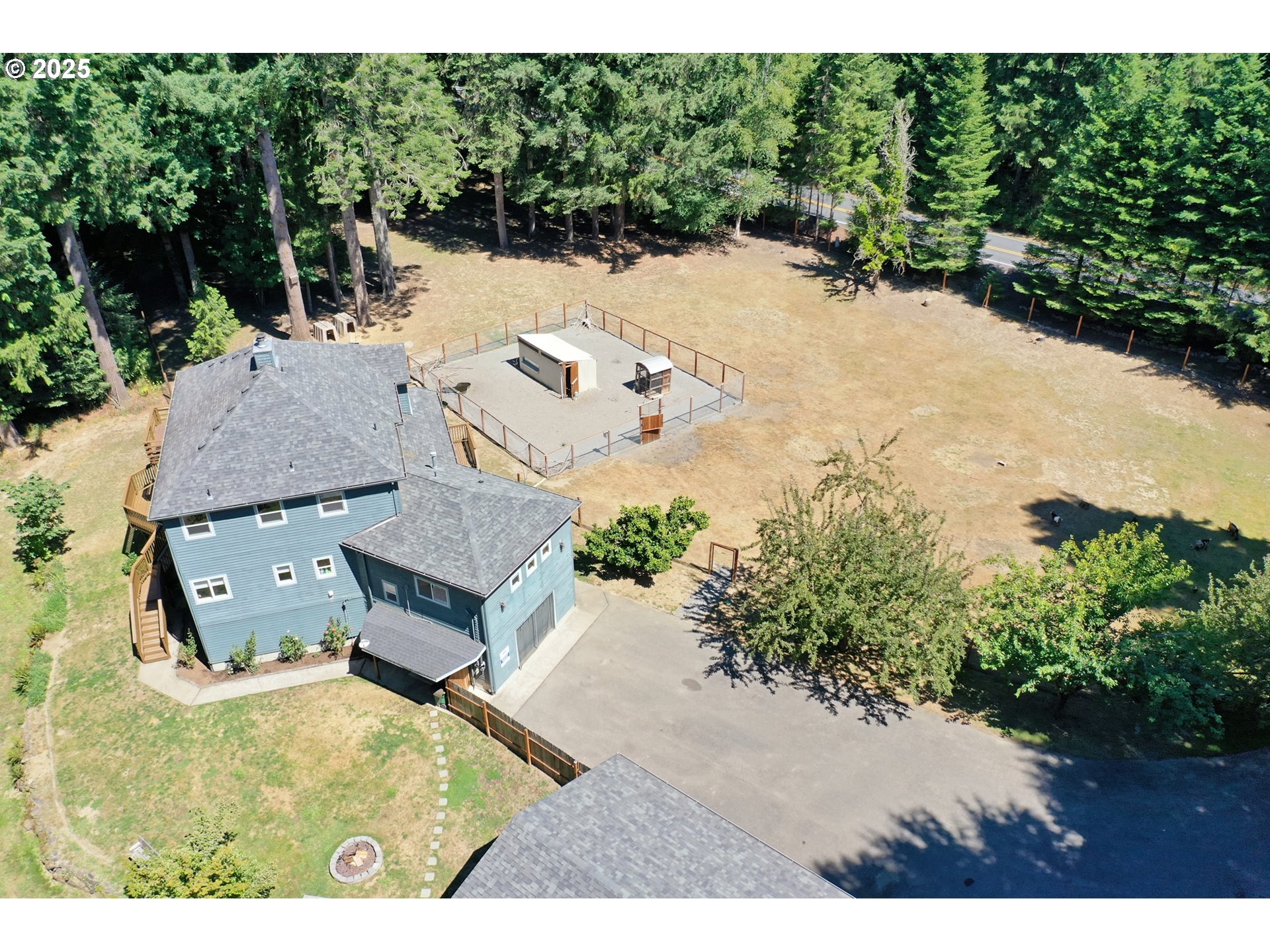 64977 Nehalem Highway North Vernonia, OR 97064 - Photo 3 of 48 an aerial view of a house with a yard basket ball court