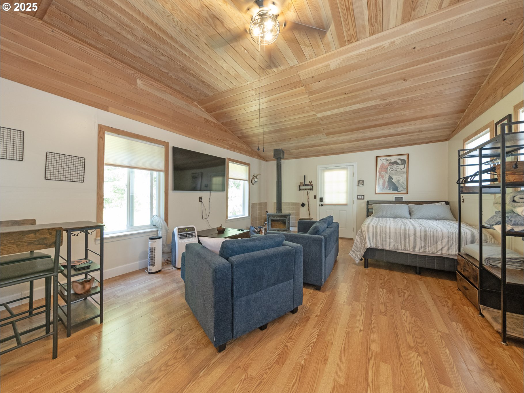 64977 Nehalem Highway North Vernonia, OR 97064 - Photo 33 of 48 a living room with furniture and a wooden floor