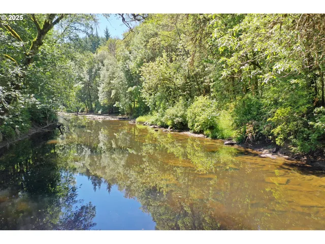 a aerial view of a house with swimming pool table and chairs