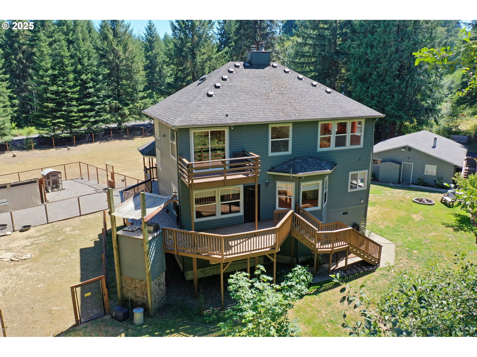 64977 Nehalem Highway North Vernonia, OR 97064 - Photo 42 of 48 a aerial view of a house with swimming pool table and chairs