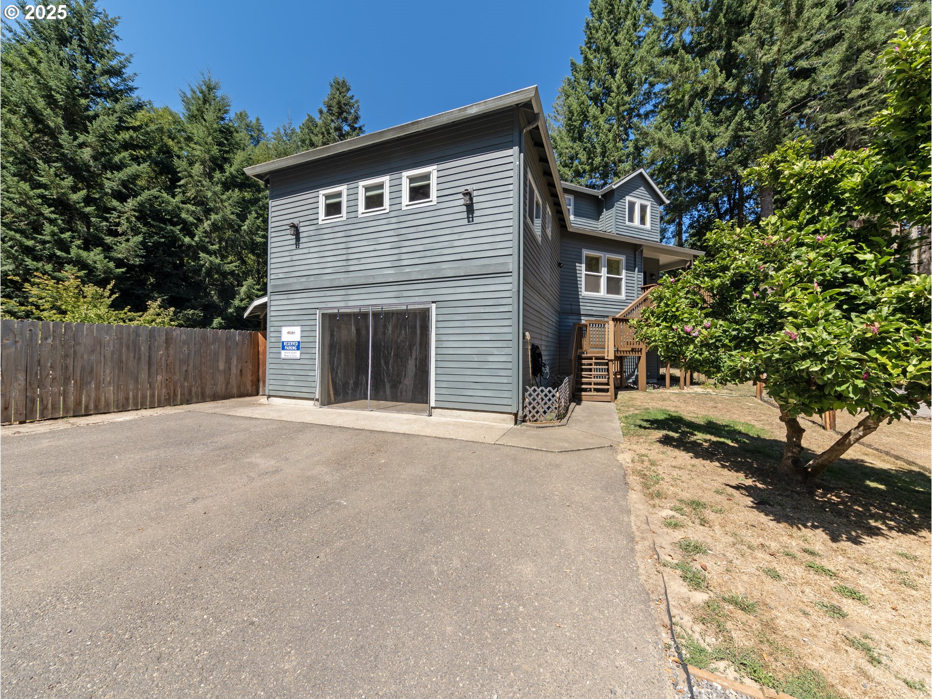 64977 Nehalem Highway North Vernonia, OR 97064 - Photo 44 of 48 a front view of a house with a yard and garage