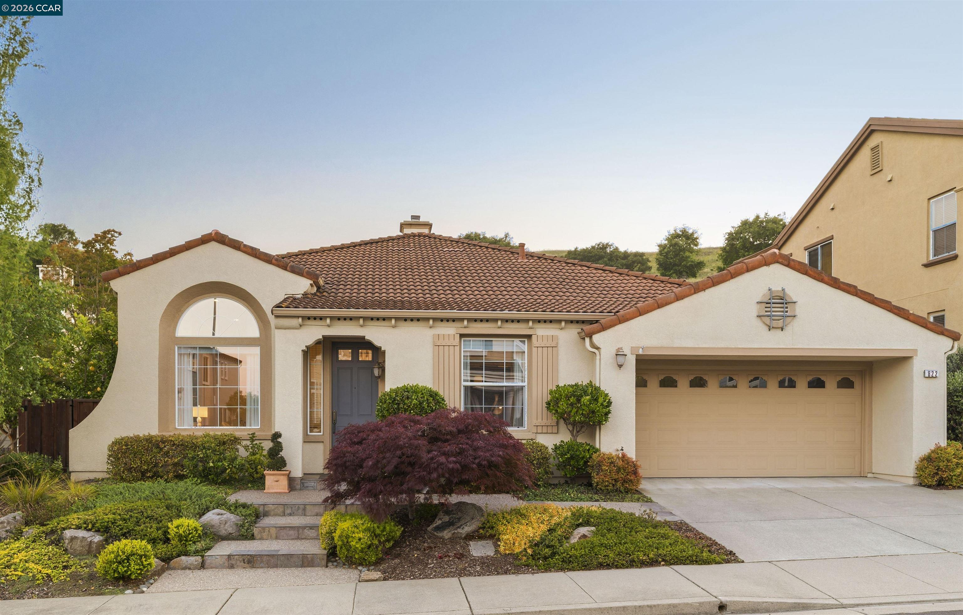 822 Pradera Way San Ramon, CA 94583 - Photo 1 of 39 a front view of a house with garden