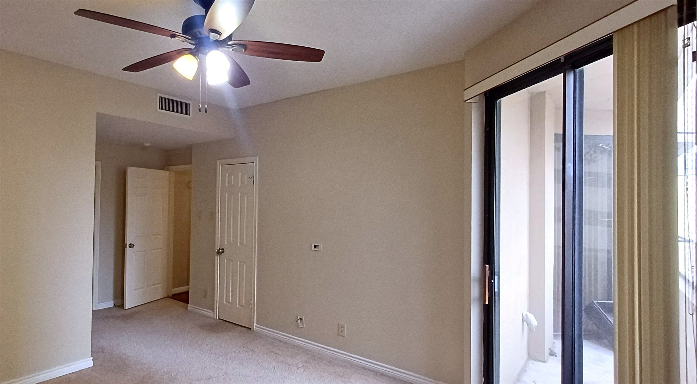 3350 McCue Road, Unit 201 Houston, TX 77056 - Photo 27 of 39 a view of a livingroom with a ceiling fan and a chandelier fan