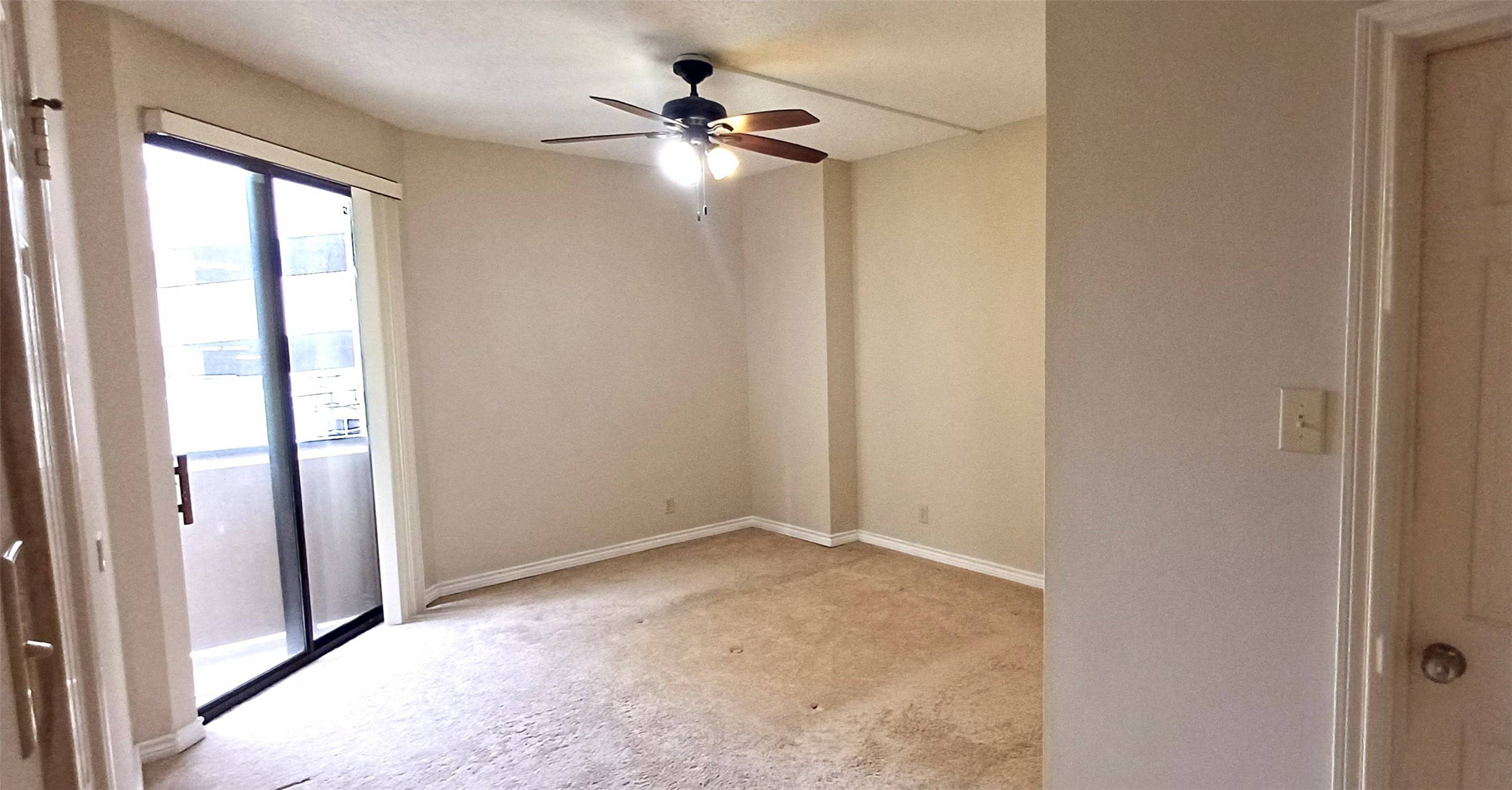 3350 McCue Road, Unit 201 Houston, TX 77056 - Photo 39 of 39 an empty room with windows and fan