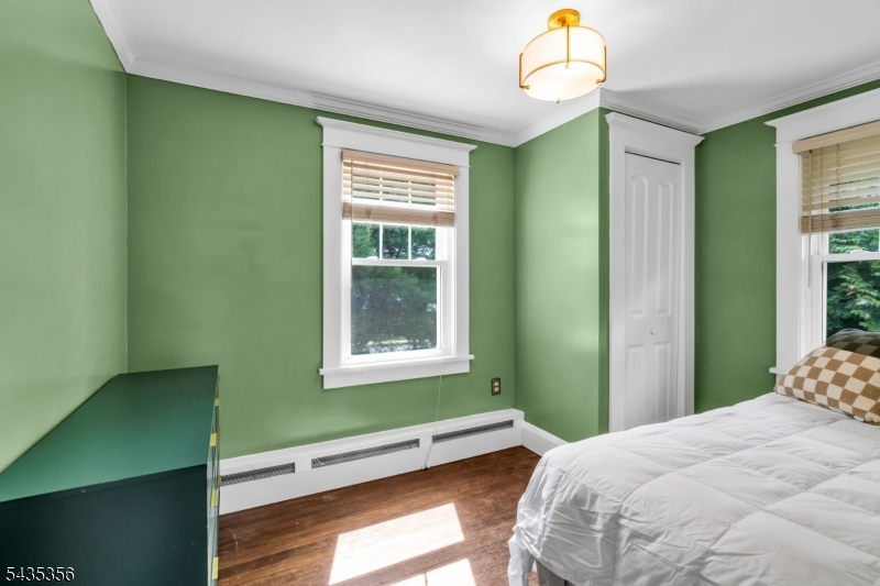 105 Somerville Road Bedminster, NJ 07921 - Photo 21 of 36 a bedroom with a bed and a window