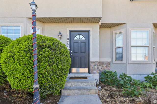 1077 South 1850th Street West Springville, UT 84663 - Photo 3 of 22 Property entrance with stucco siding and stone siding