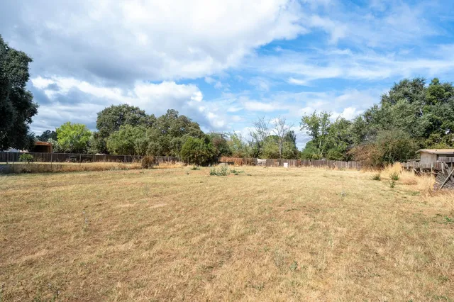 a view of swimming pool with an outdoor space and seating area