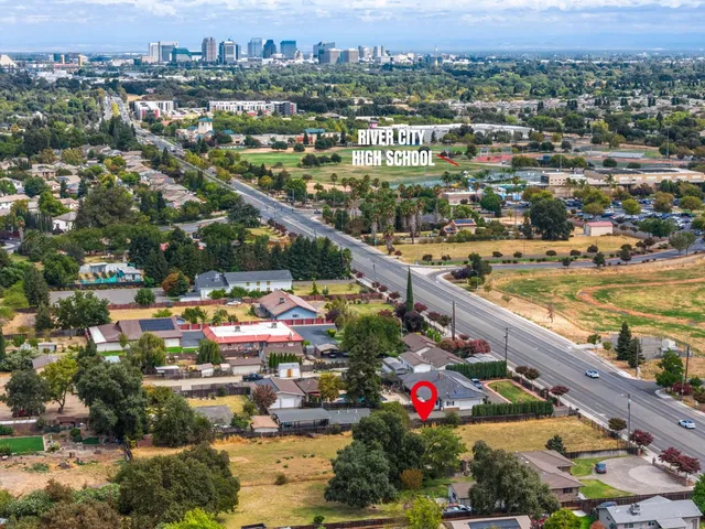 a view of city and swimming pool