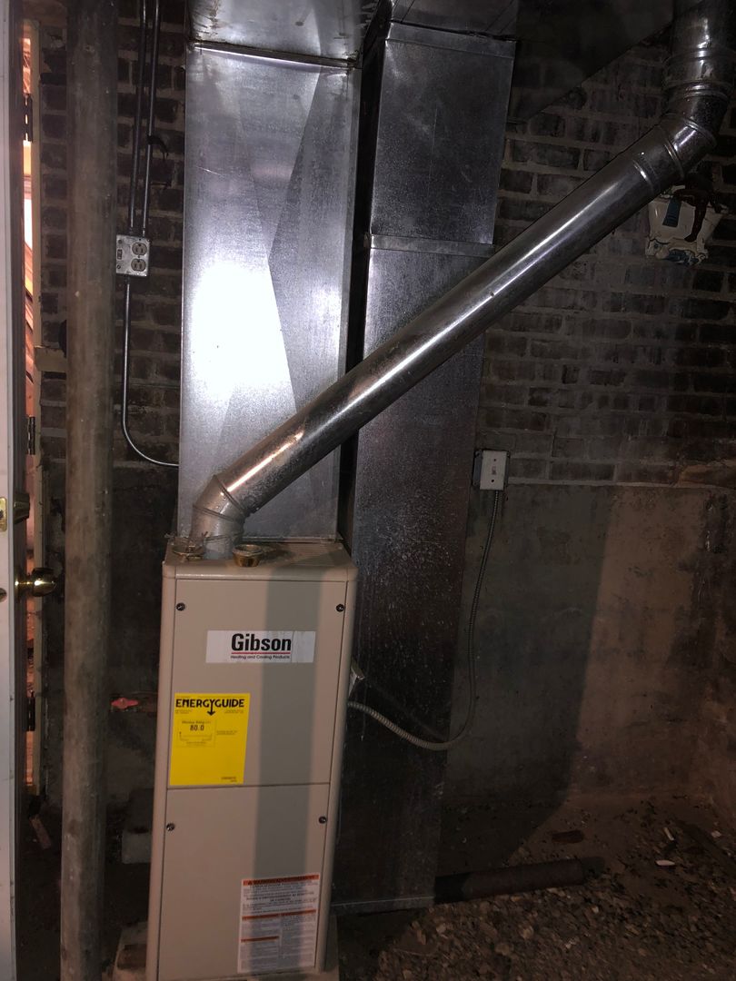 7757 South Paulina Street Chicago, IL 60620 - Photo 15 of 17 a close view of water heater room