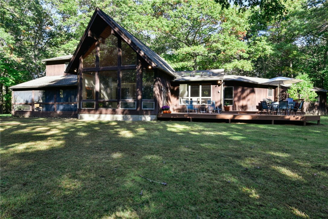 55 Ridge Drive Exeter, RI 02822 - Photo 34 of 37 exterior, showcasing the large, cathedral great room
55 Ridge Dr Exeter, RI 02822
