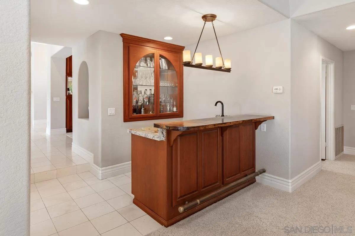 14134 Palisades Drive Poway, CA 92064 - Photo 17 of 32 a view of a kitchen from a hallway