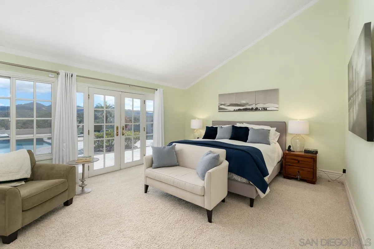 14134 Palisades Drive Poway, CA 92064 - Photo 18 of 32 a bedroom with bed and a large window