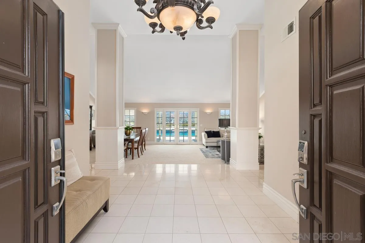 14134 Palisades Drive Poway, CA 92064 - Photo 2 of 32 a dining hall with stainless steel appliances granite countertop a refrigerator and a fireplace