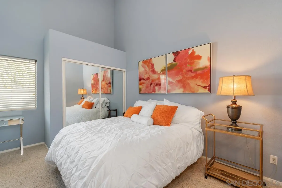 14134 Palisades Drive Poway, CA 92064 - Photo 23 of 32 a bedroom with a bed and window