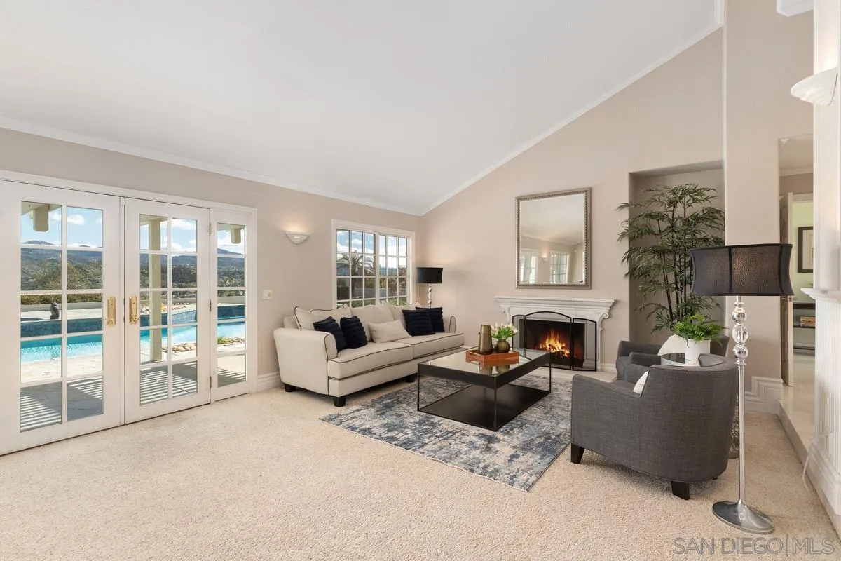 14134 Palisades Drive Poway, CA 92064 - Photo 4 of 32 a living room with furniture and a fireplace