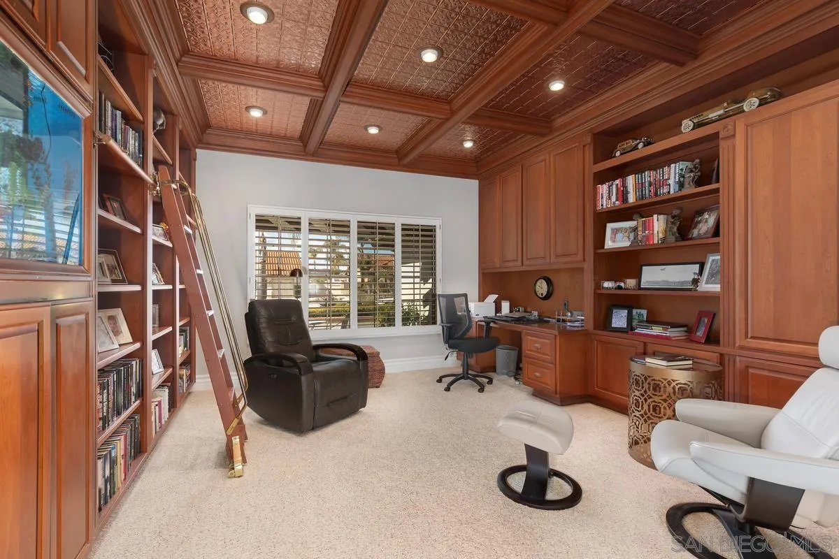 14134 Palisades Drive Poway, CA 92064 - Photo 8 of 32 a view of a livingroom with workspace and a couch