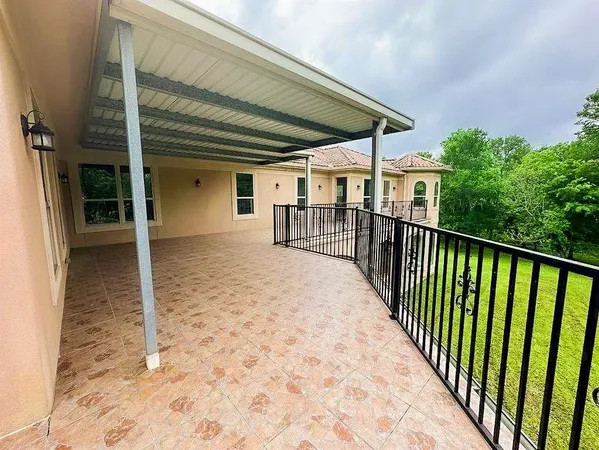 a view of a room with lots of windows