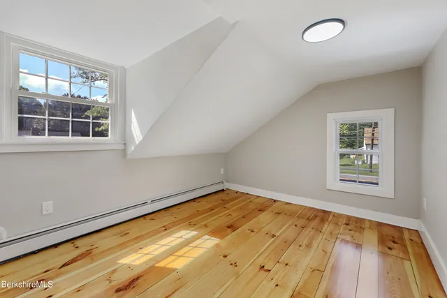 a view of empty room with windows