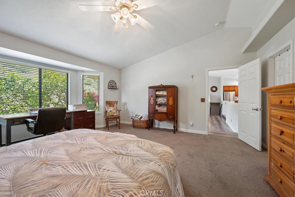 11625 Cenegal Road Atascadero, CA 93422 - Photo 14 of 54 a bed room with a bed and a large window