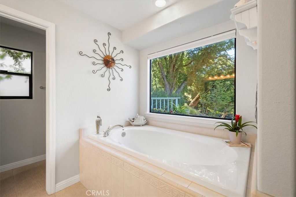11625 Cenegal Road Atascadero, CA 93422 - Photo 16 of 54 a white bath tub sitting next to a window