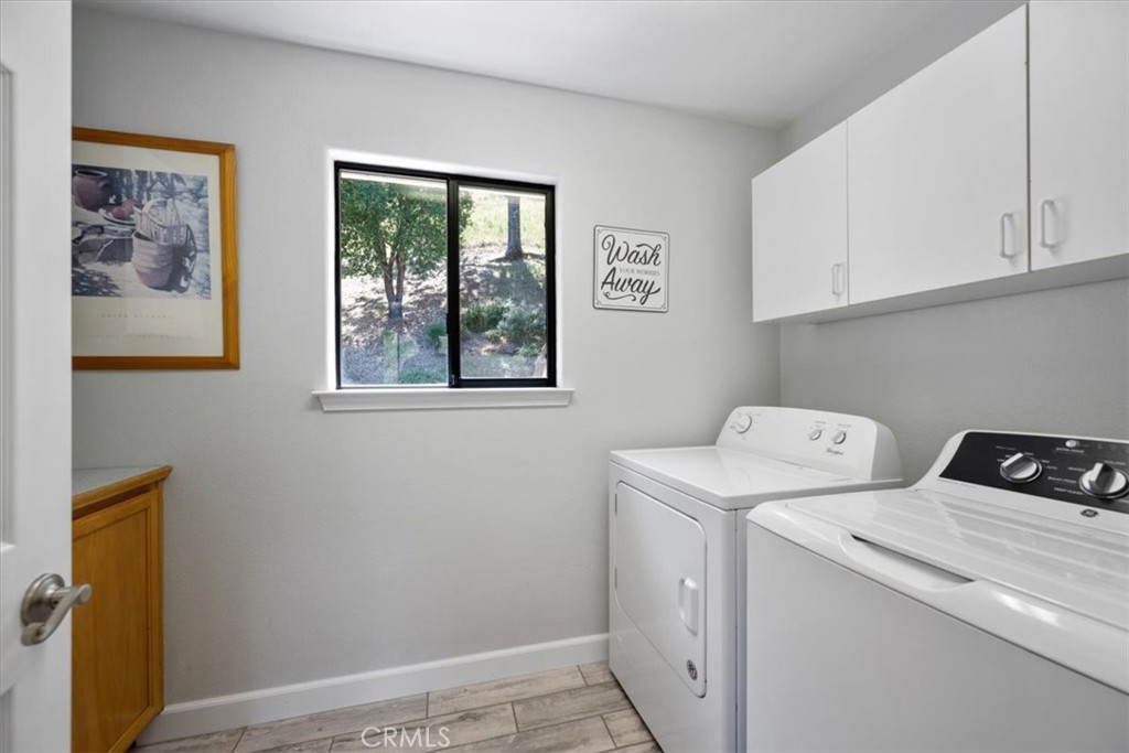 11625 Cenegal Road Atascadero, CA 93422 - Photo 23 of 54 a utility room with dryer and washer