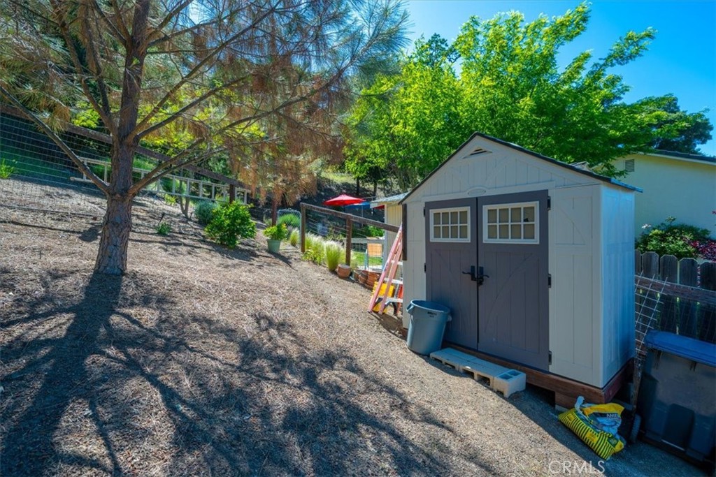 11625 Cenegal Road Atascadero, CA 93422 - Photo 40 of 54 a view of a house with a yard and tree s