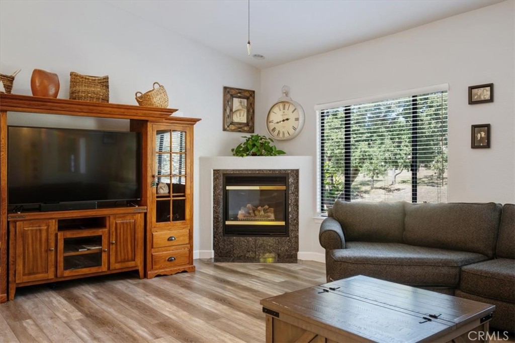 11625 Cenegal Road Atascadero, CA 93422 - Photo 7 of 54 a living room with furniture and a flat screen tv