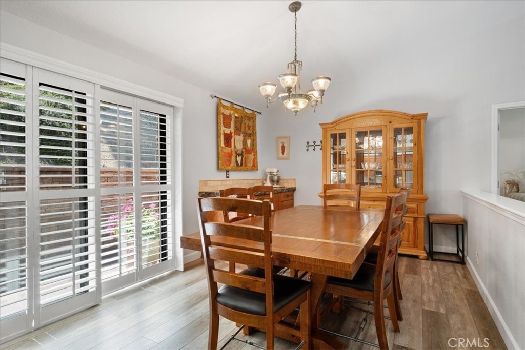 11625 Cenegal Road Atascadero, CA 93422 - Photo 10 of 54 a view of a dining room with furniture window and wooden floor