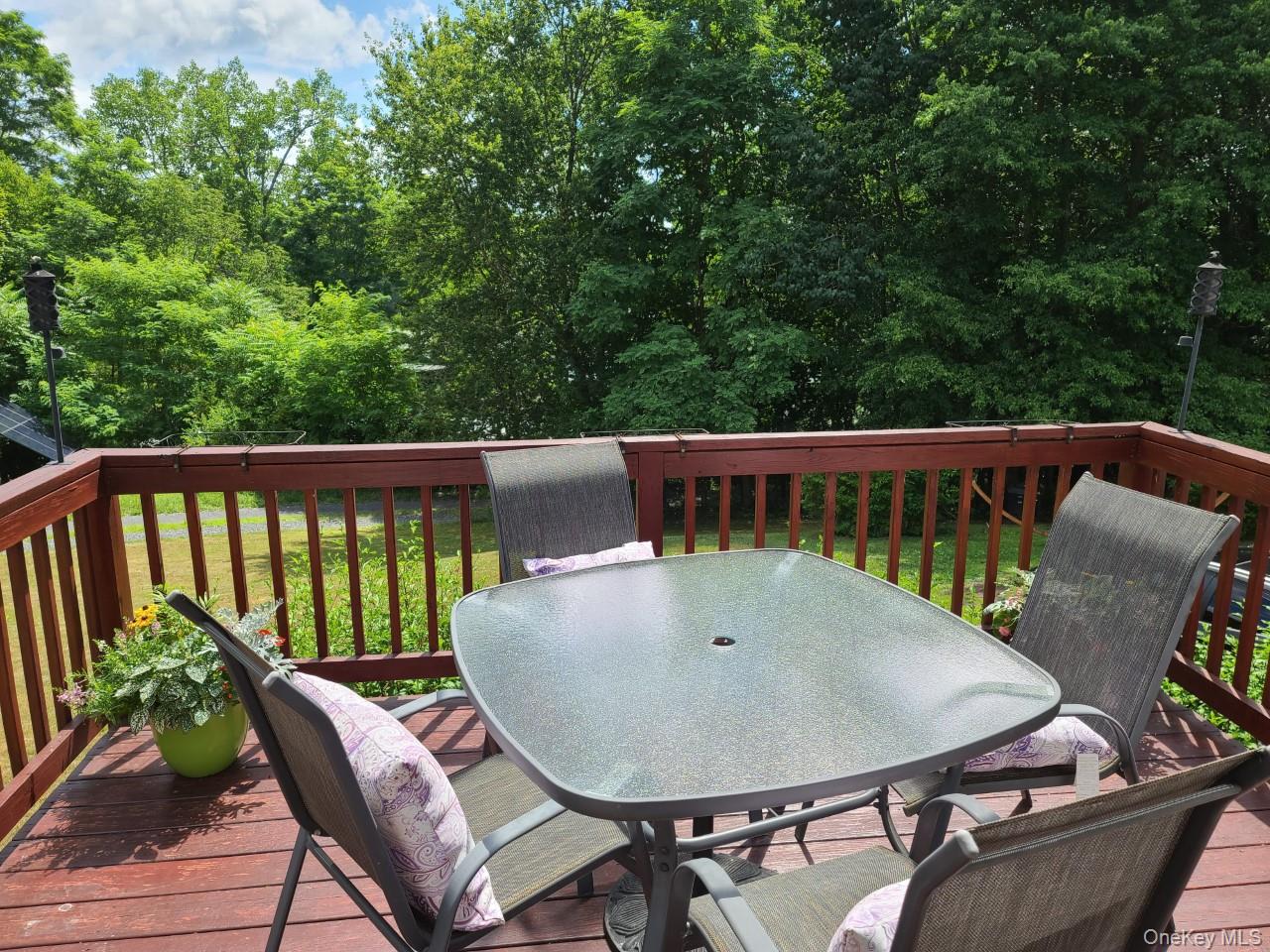 11 Beacham Road Rhinebeck, NY 12572 - Photo 14 of 27 a view of a chair and table on the roof deck