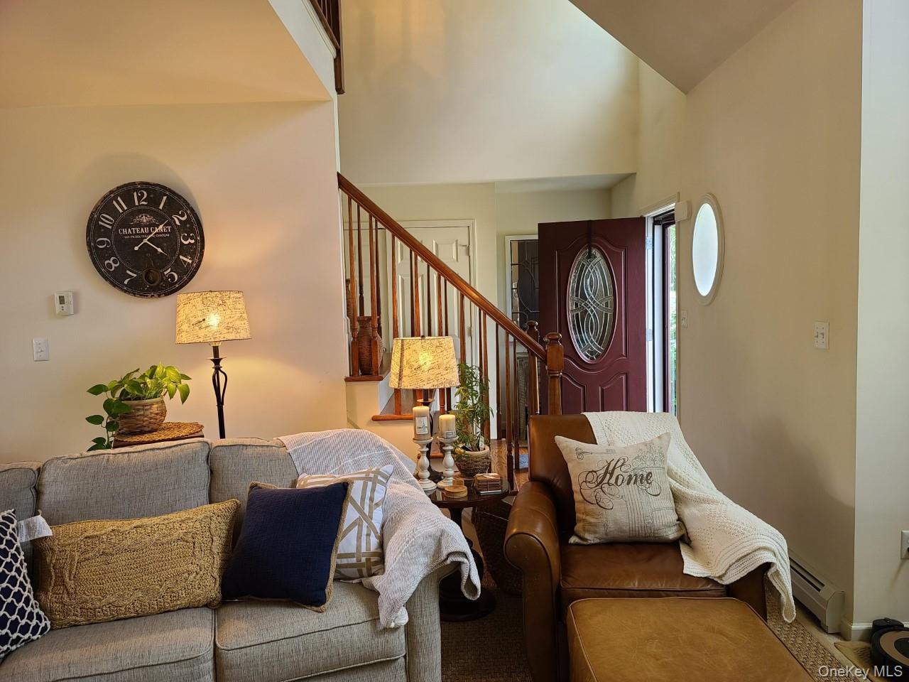 11 Beacham Road Rhinebeck, NY 12572 - Photo 16 of 27 a living room with furniture and a wooden floor