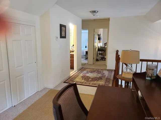 a bedroom with furniture and a bed