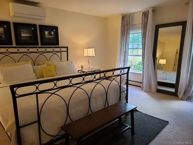 a view of an entryway with a mirror