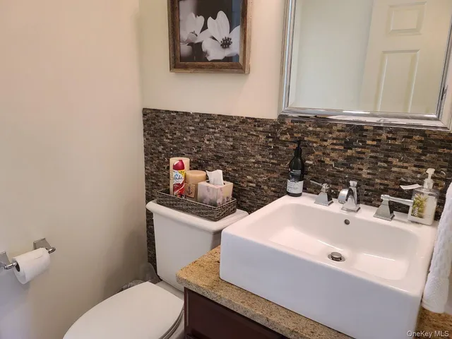 a bathroom with a sink and a toilet