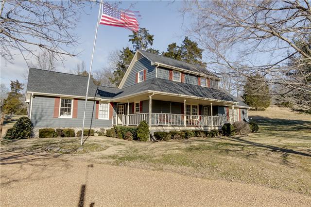 155 S Road Cottontown, TN 37048 - Photo 2 of 20 a front view of a house with a yard