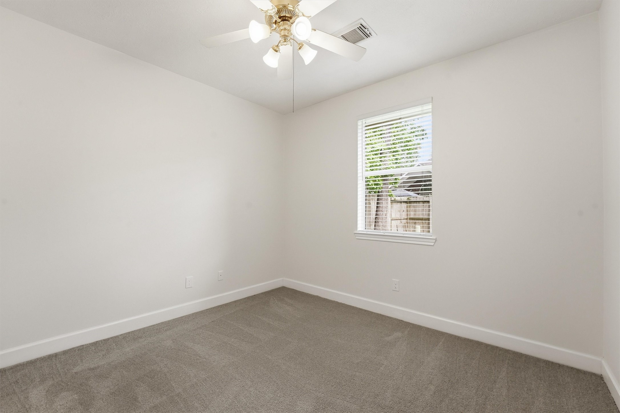 20507 Delta Wood Trail Humble, TX 77346 - Photo 18 of 28 an empty room with a window