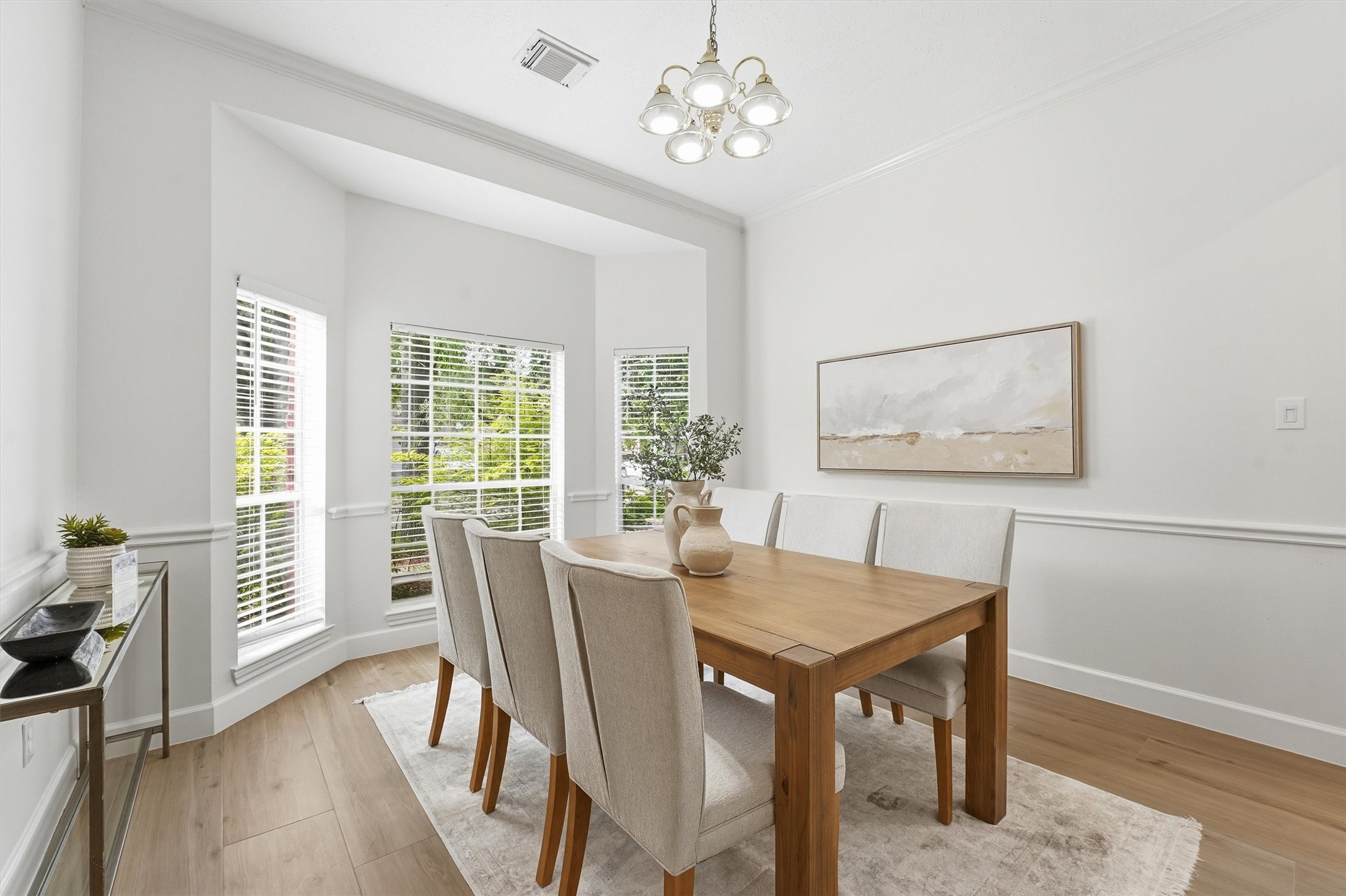 20507 Delta Wood Trail Humble, TX 77346 - Photo 5 of 28 a view of a dining room with furniture wooden floor and a chandelier