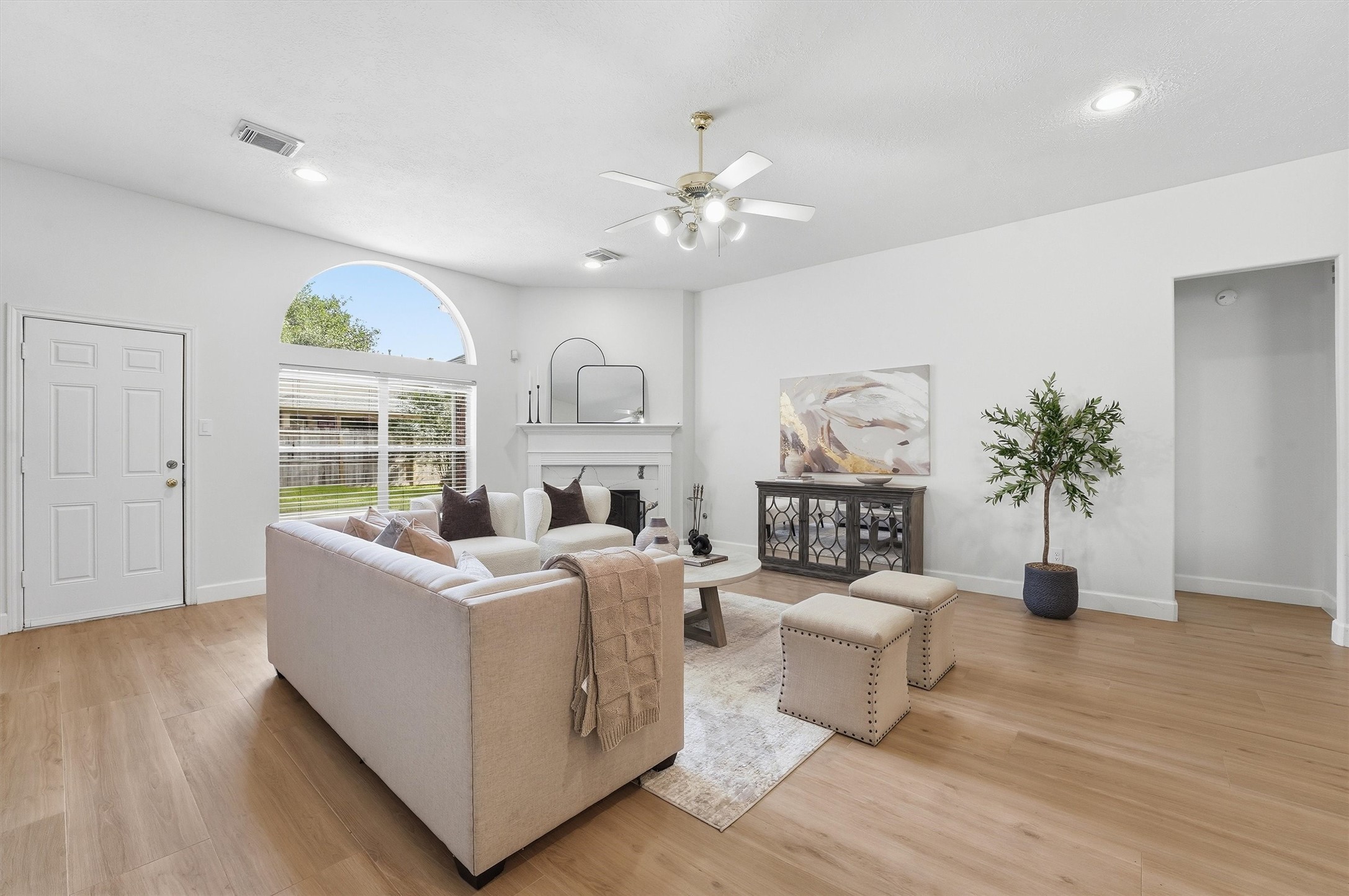 20507 Delta Wood Trail Humble, TX 77346 - Photo 9 of 28 a living room with furniture large window and wooden floor