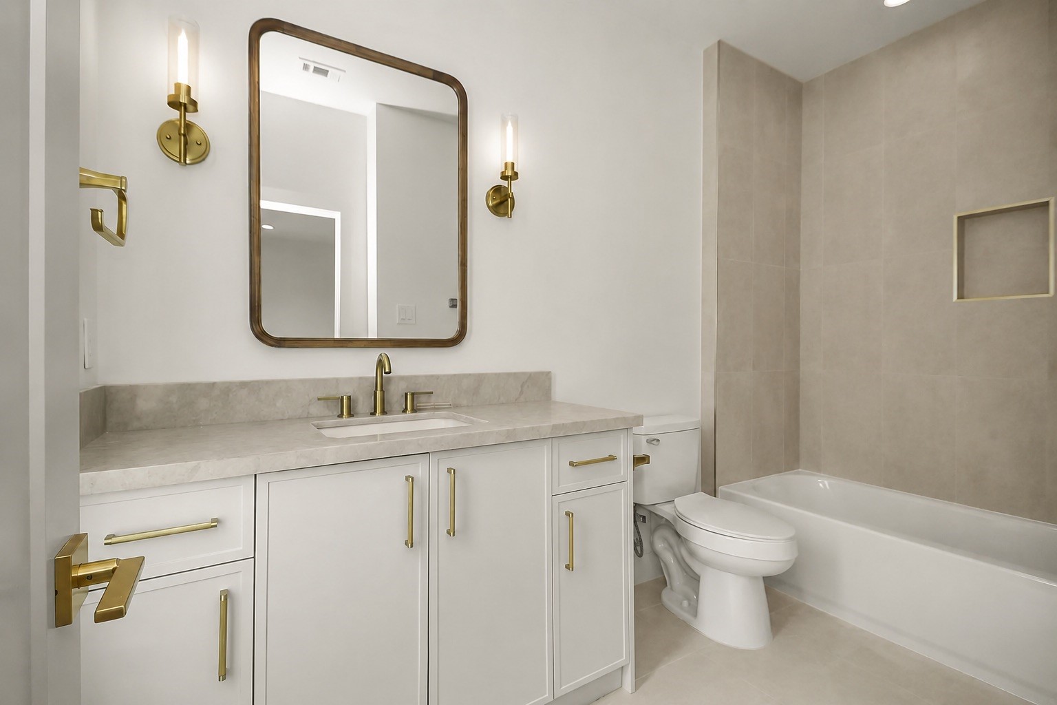 1109 Tabor Street Houston, TX 77009 - Photo 25 of 38 a bathroom with a granite countertop toilet sink and mirror