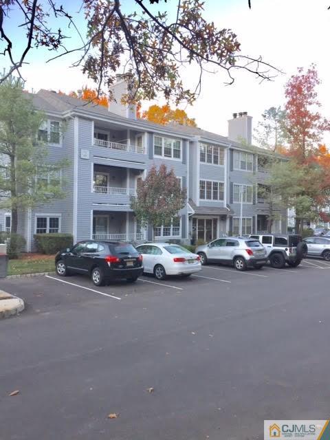 a view of a street with cars