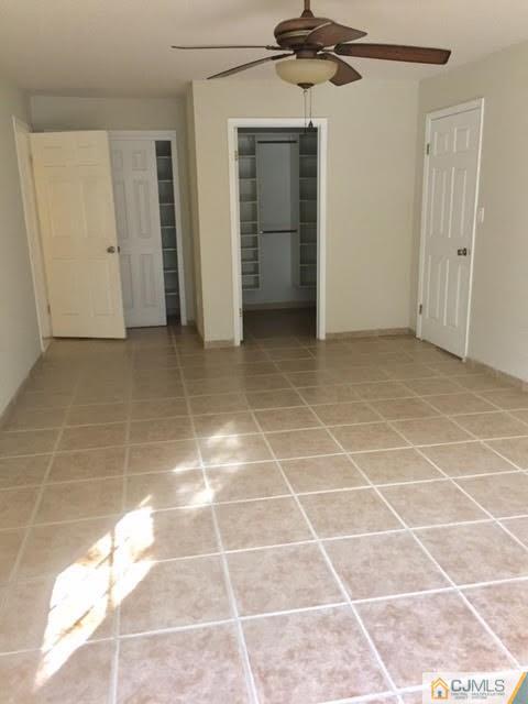 201 Raintree Court, Unit 201 Helmetta, NJ 08828 - Photo 14 of 20 a view of a room with a black and white checkered floor