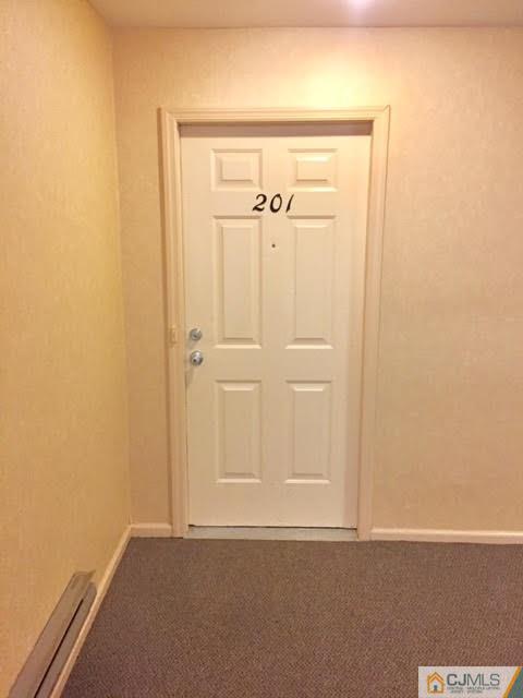 201 Raintree Court, Unit 201 Helmetta, NJ 08828 - Photo 5 of 20 an empty room with window