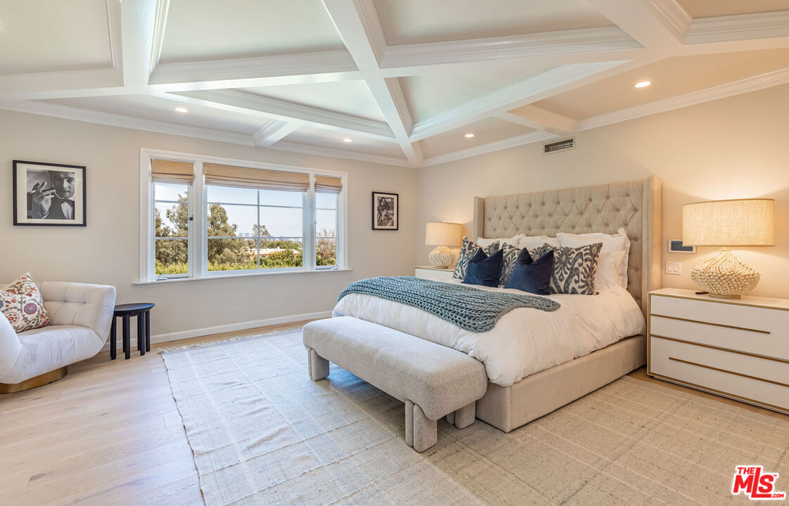 1756 Correa Way Los Angeles, CA 90049 - Photo 17 of 38 a bedroom with a bed and a couch