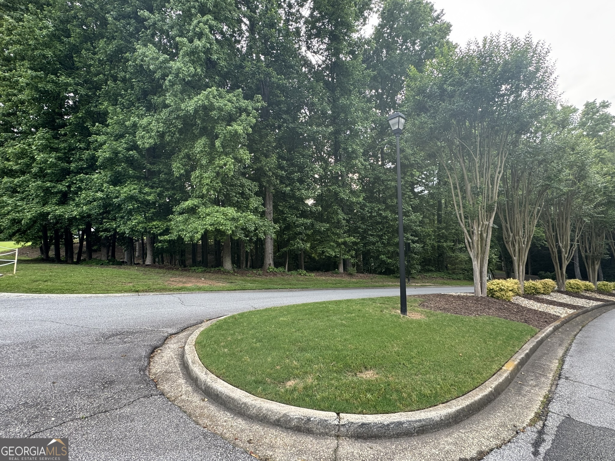 4708 Upper Berkshire Road, Unit LOT 39 Flowery Branch, GA 30542 - Photo 11 of 22 a view of a swimming pool with a yard