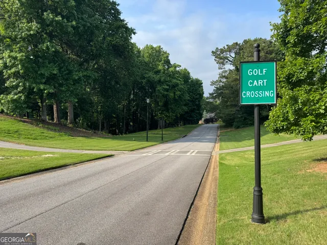 a view of a park with welcome board
