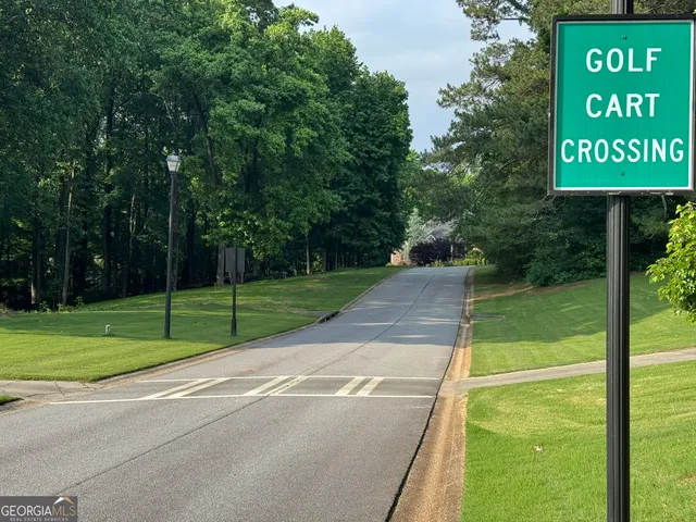 a sign board with garden