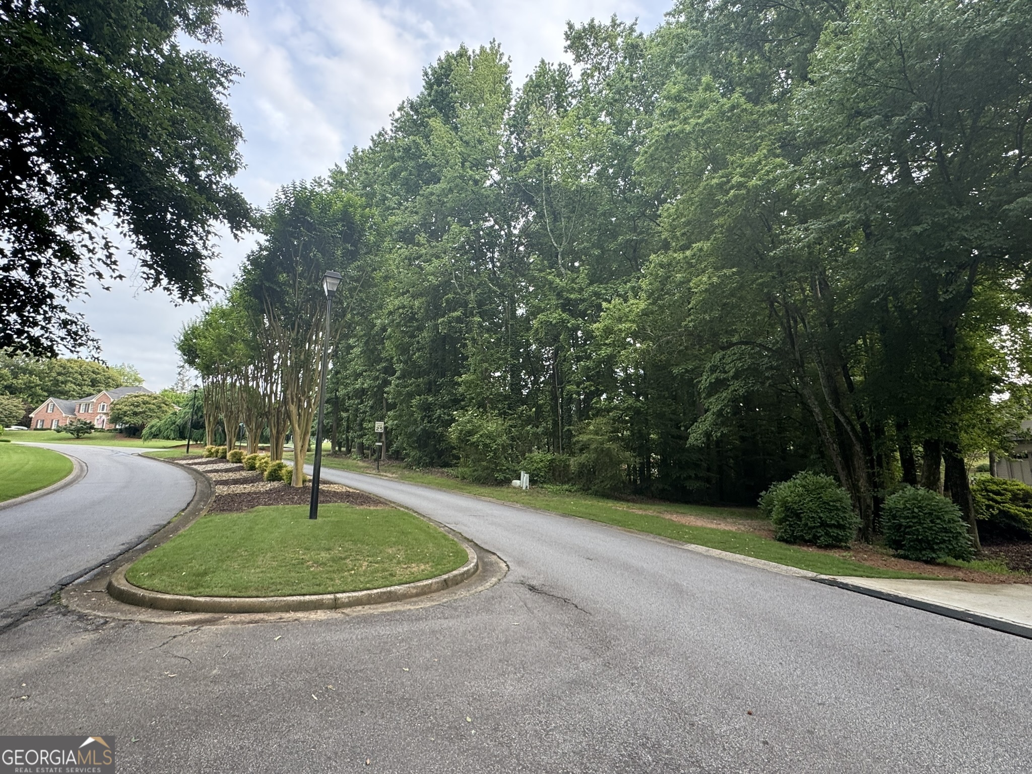 4708 Upper Berkshire Road, Unit LOT 39 Flowery Branch, GA 30542 - Photo 8 of 22 a view of a basketball court