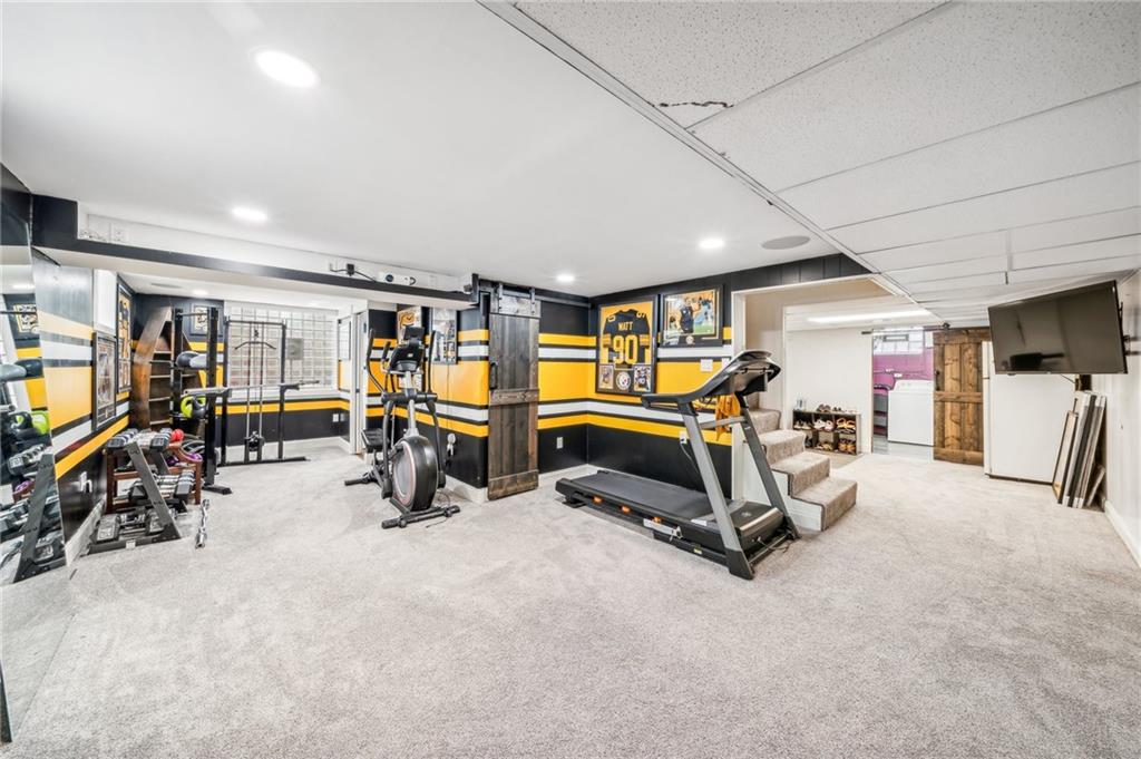 1013 Silver Lane McKees Rocks, PA 15136 - Photo 18 of 33 Wow!! Check out this Game Room! Newer carpet and Pittsburgh Steelers paint theme